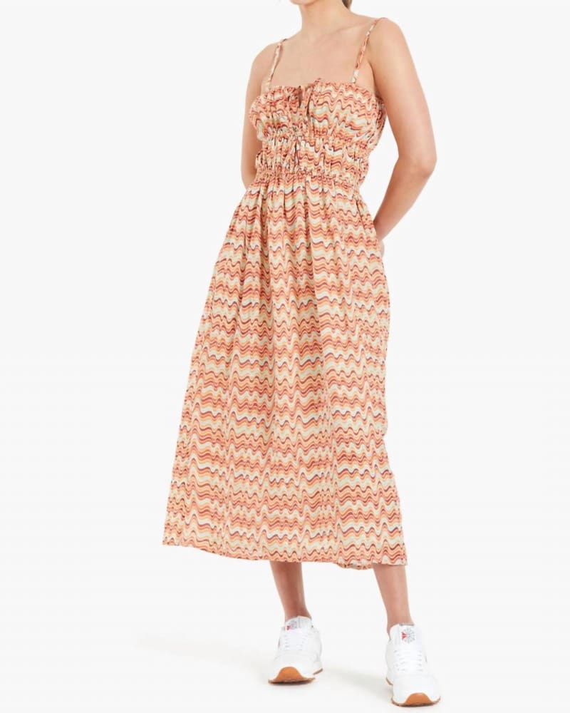 Front of a model wearing a size L Francesca Midi Dress in Vadella Print Dusk in Vadella Print Dusk by FAITHFULL THE BRAND. | dia_product_style_image_id:335181